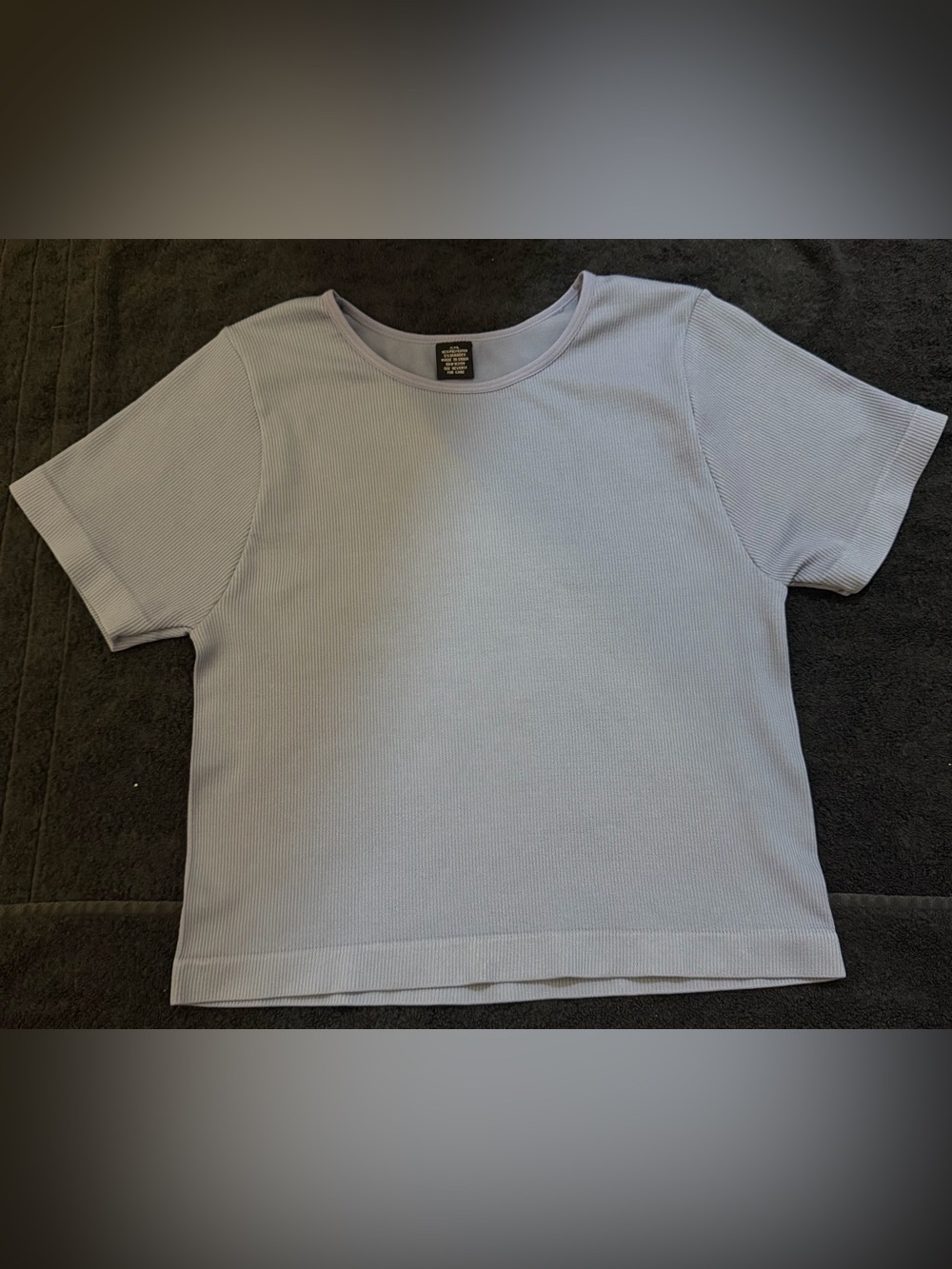 Woman’s Short Sleeve Ribbed Top - Light blue
